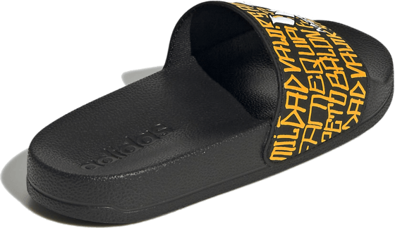 ADIDAS Messi Adilette Shower Slides sivustolla stadium.fi